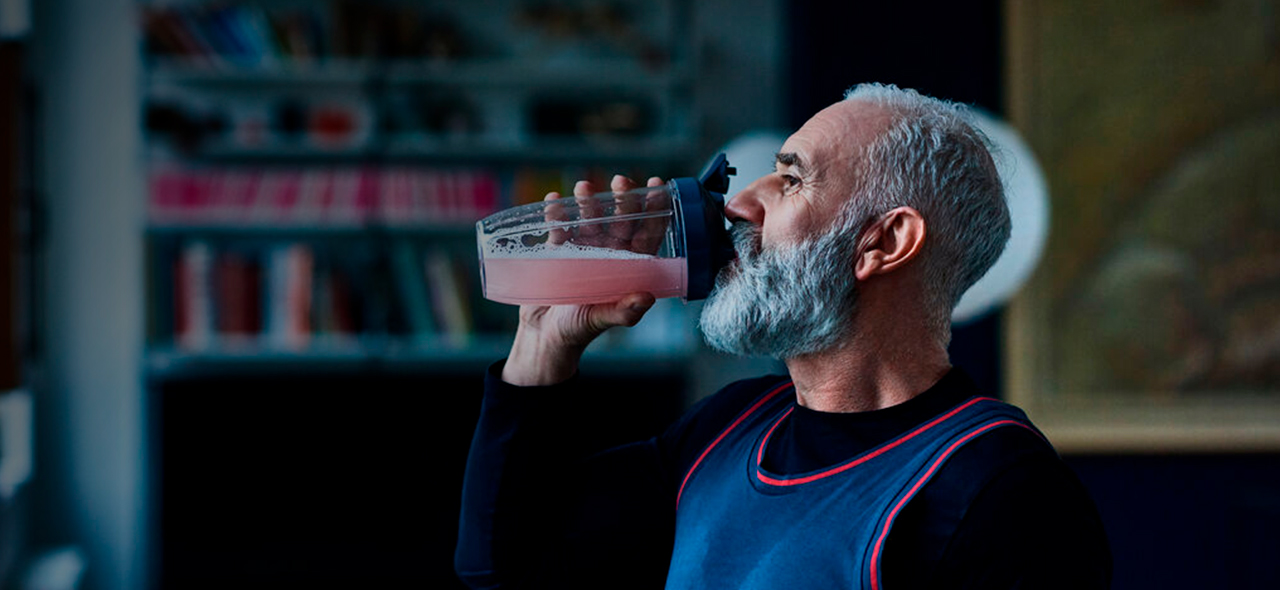 11673_Main Page IMGs_1280x590_Man with protein shake (1).jpg 